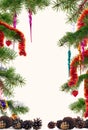 Christmas tree branches decorated with colorful ornaments background frame