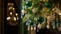 Christmas tree branches with golden green vintage ornaments and baubles