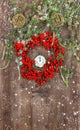 Christmas tree branches and wreath from red berrie Royalty Free Stock Photo