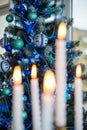 Christmas tree after the candlestick with lighted candles Royalty Free Stock Photo