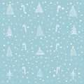 Christmas tree and cane candy pattern on blue background