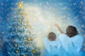 Christmas Tree and Children Looking to Star, Kids with Wings as Xmas Angels in Night Royalty Free Stock Photo