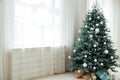 Christmas tree Christmas decoration interior of the white room with postcard gifts