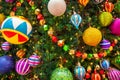 Christmas tree with colorful ornament and toys, closeup photo for background. Christmas tree ornament banner template Royalty Free Stock Photo