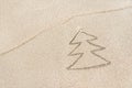 Christmas tree contour with star and wave on the beach