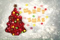 Christmas tree with cranberries and candies with text Merry Xmas