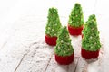 Christmas tree cupcakes on snow Royalty Free Stock Photo