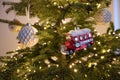 Christmas tree deco. Antique toys, a red bus.