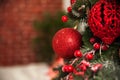 Christmas tree decor in red style and bokeh. Christmas tree, Christmas decorations, toys close-up and copy space. Hygge New Years Royalty Free Stock Photo