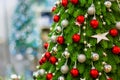 Christmas tree decorated with balls of red, gold and silver colors Royalty Free Stock Photo