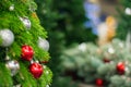 Christmas tree decorated with balls of red and silver colors Royalty Free Stock Photo