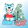 Christmas tree decorated with balls and ribbons. Year of Blue Tiger. Gift in hands of baby. Children`s photo frame. Cute baby Royalty Free Stock Photo