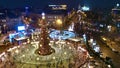 A Christmas tree with garlands illuminates the Christmas fair on Sofiyivska Square on Christmas Eve in Kyiv, Ukraine