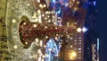 A Christmas tree with garlands illuminates the Christmas fair on Sofiyivska Square on Christmas Eve in Kyiv, Ukraine