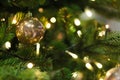 Christmas tree decorated with golden shiny baubles Royalty Free Stock Photo
