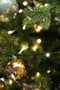 Christmas tree decorated with golden shiny baubles Royalty Free Stock Photo