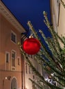 Christmas tree decorated illumination red gold ball   confetti on evening street in old town of Tallinn holiday in Estonia holiday Royalty Free Stock Photo