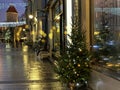 Holiday city light  Christmas tree decorated red balls and illumination on street ,people walking travel to Tallinn  Europe, Night Royalty Free Stock Photo