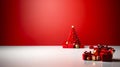 Christmas tree decorated with several red and gold balls with beautifully wrapped presents underneath Royalty Free Stock Photo