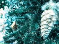 Christmas tree decorated with toy wood fir-tree with bristle, pine cones, baubles, stars and lights. New Year celebration concept Royalty Free Stock Photo