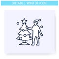 Christmas tree decorating line icon. Editable