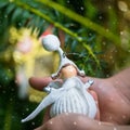 Christmas Tree Decoration Angel in Hands of Little Girl Royalty Free Stock Photo