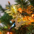 Christmas tree decoration in home, closeup reindeer ornament