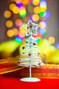 Christmas tree decoration ornament isolated on blurred background of  lights Royalty Free Stock Photo