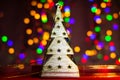 Christmas tree decoration ornament isolated on blurred background of  lights Royalty Free Stock Photo