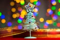 Christmas tree decoration ornament isolated on blurred background of  lights Royalty Free Stock Photo