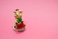 Christmas tree decoration in shape of pig with fir tree and Santa costume on living coral background. Happy China New 2019 year, Royalty Free Stock Photo