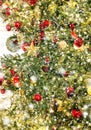 Christmas tree decoration stars ornaments lights falling snow Royalty Free Stock Photo