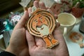 Christmas tree decoration tiger on hand. Symbol of the year 2022