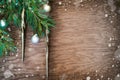 Christmas tree with decoration on a wooden board