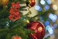 Christmas tree with decorations, christmas balls, light garlands, bokeh. Abstract festive background for design Royalty Free Stock Photo