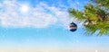 Christmas tree and decorations on the blue sky background. Picturesque winter composition. Royalty Free Stock Photo