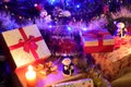 Christmas tree with decorations and fairy lights surrounded by many presents gift for christmas and new year celebration. Royalty Free Stock Photo