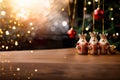 Christmas tree decorations in the form of the Three Wise Men against, sparkling bokeh. Religious holiday of Epiphany