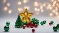 christmas tree and decorations A green polygonal christmas tree with a star and red and yellow spheres on a white background Royalty Free Stock Photo