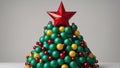 christmas tree and decorations A green polygonal christmas tree with a star and red and yellow spheres on a white background Royalty Free Stock Photo