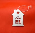 Christmas wooden cute white toy on red background Royalty Free Stock Photo