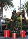 Christmas tree with decorations before Jurassic park entrance in Universal Studios Hollywood Royalty Free Stock Photo