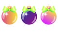 Christmas-tree decorations - a set of three shiny, bright, glass balls - pink, orange and purple with green bows. Sparkling Christ