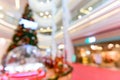 Christmas tree and decorations in a shopping mall at blurred focus horizontal composition as background Royalty Free Stock Photo