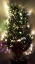 Christmas tree with fiber optic lights against clear background Royalty Free Stock Photo