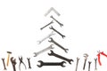 Christmas tree figure made of old rusty wrench isolated on white Royalty Free Stock Photo