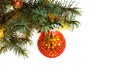 Christmas tree fir branch with hanging handmade craft new year toy ball pattern from red beads Royalty Free Stock Photo