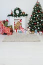 Christmas tree with fireplace interior of white room new year decoration garland gifts Royalty Free Stock Photo