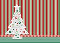 Christmas tree formed with gray triangles with a star on the tip adorned with red, green and white circles on a wall with tapestry Royalty Free Stock Photo