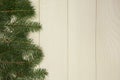Christmas tree framework branches on wooden background with copy space. Horizontal template for design